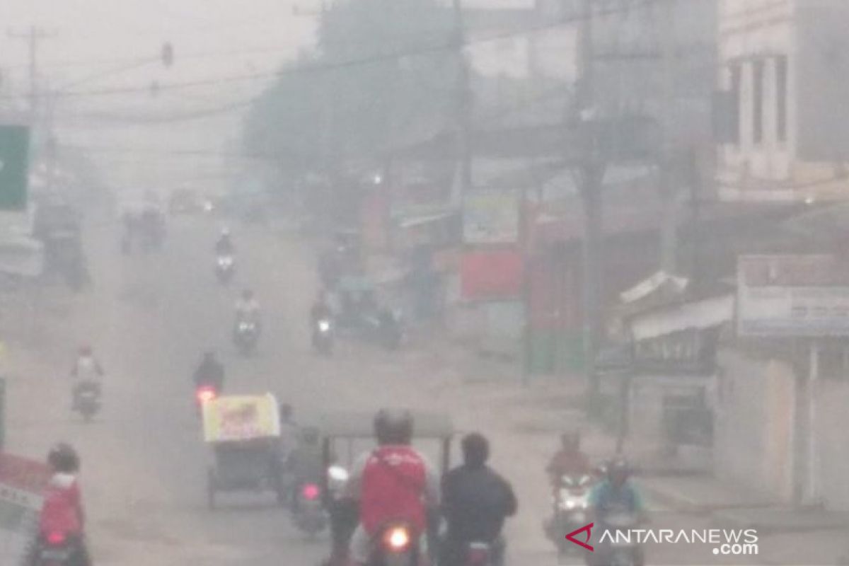 Hak kesehatan dan pendidikan warga terenggut karena asap