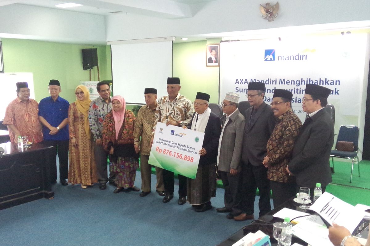 Unit syariah AXA Mandiri salurkan dana surplus underwriting