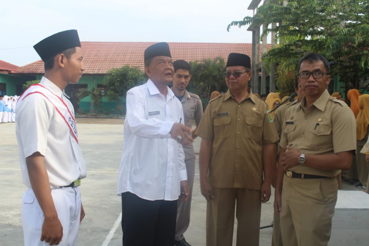 Wabup Paser Ingatkan Jangan Gunakan Bendera Usang