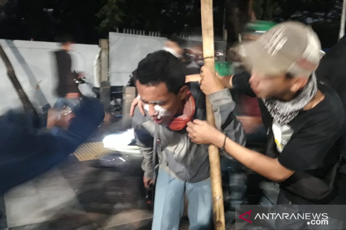 Demonstrators clash with security personnel near Semanggi interchange