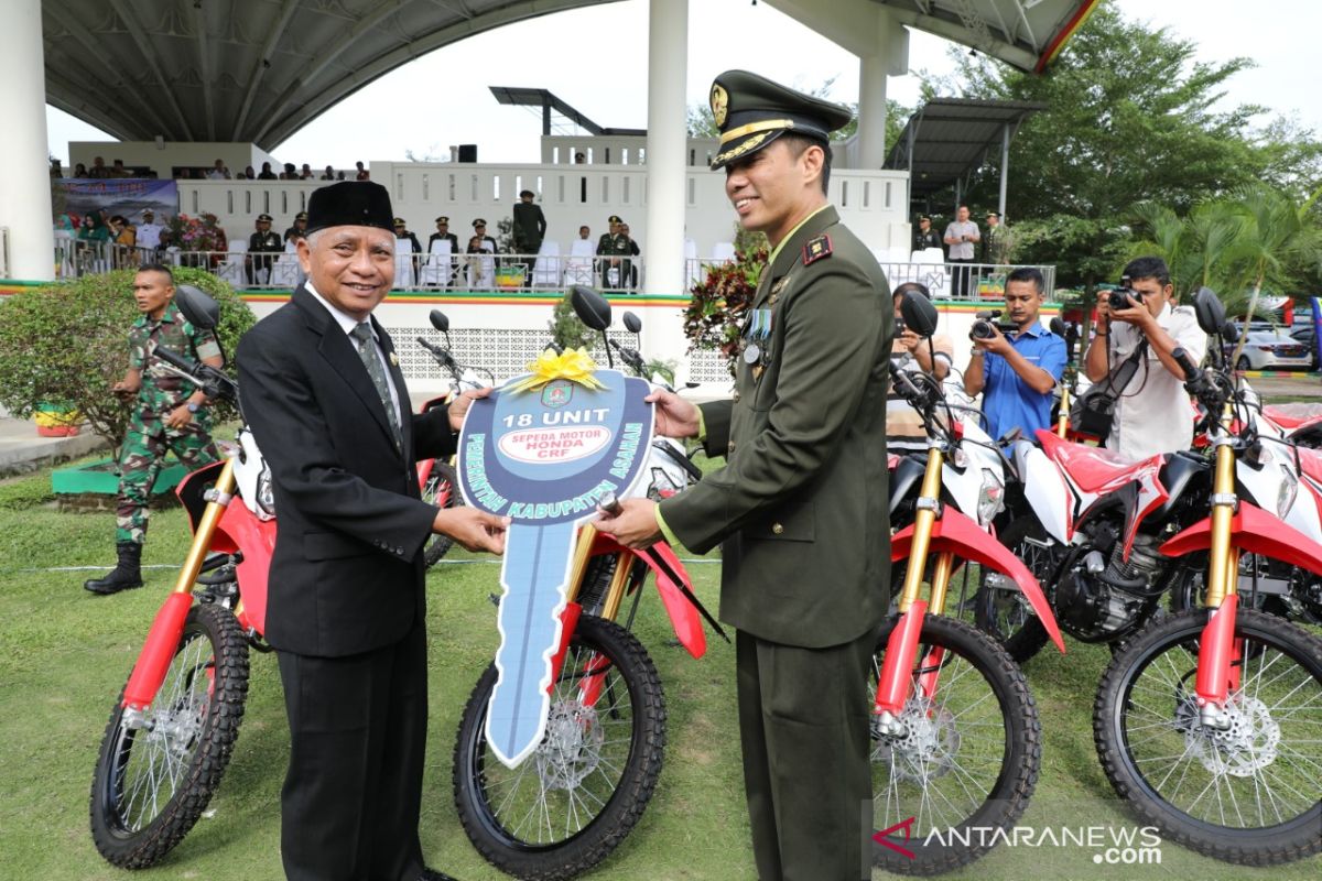 Bupati Asahan serahkan  18 sepeda motor CtRF Kepada Dandim