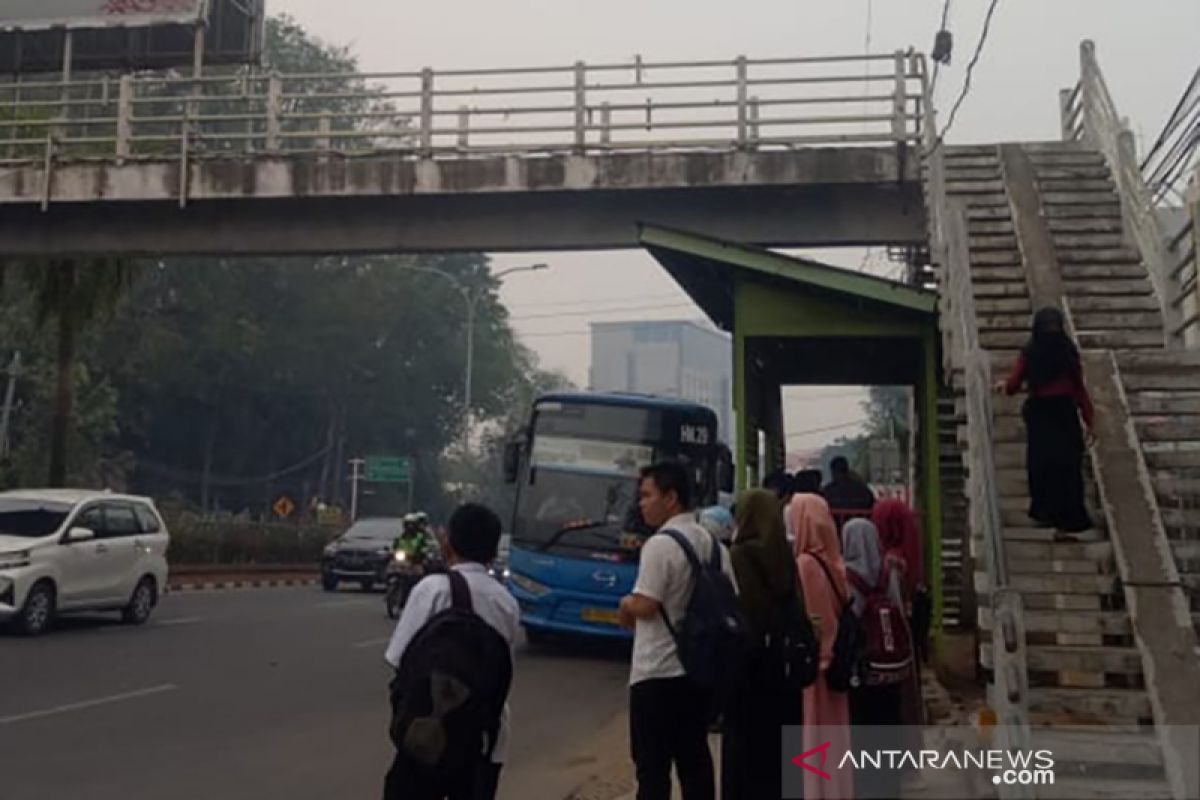 Kota Palembang masih diselimuti asap