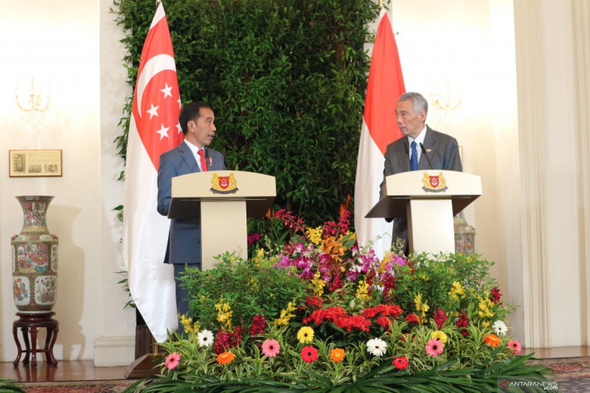 President Widodo meets Prime Minister Long