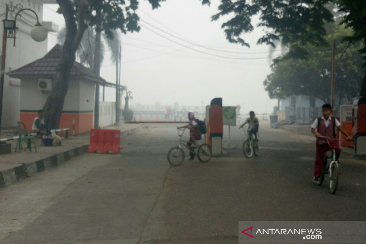 Akibat kabut asap, sekolah di Palembang pulangkan siswanya