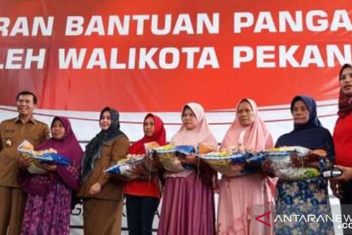 Pekanbaru menjaga ekonomi keluarga pra sejahtera lewat BPNT