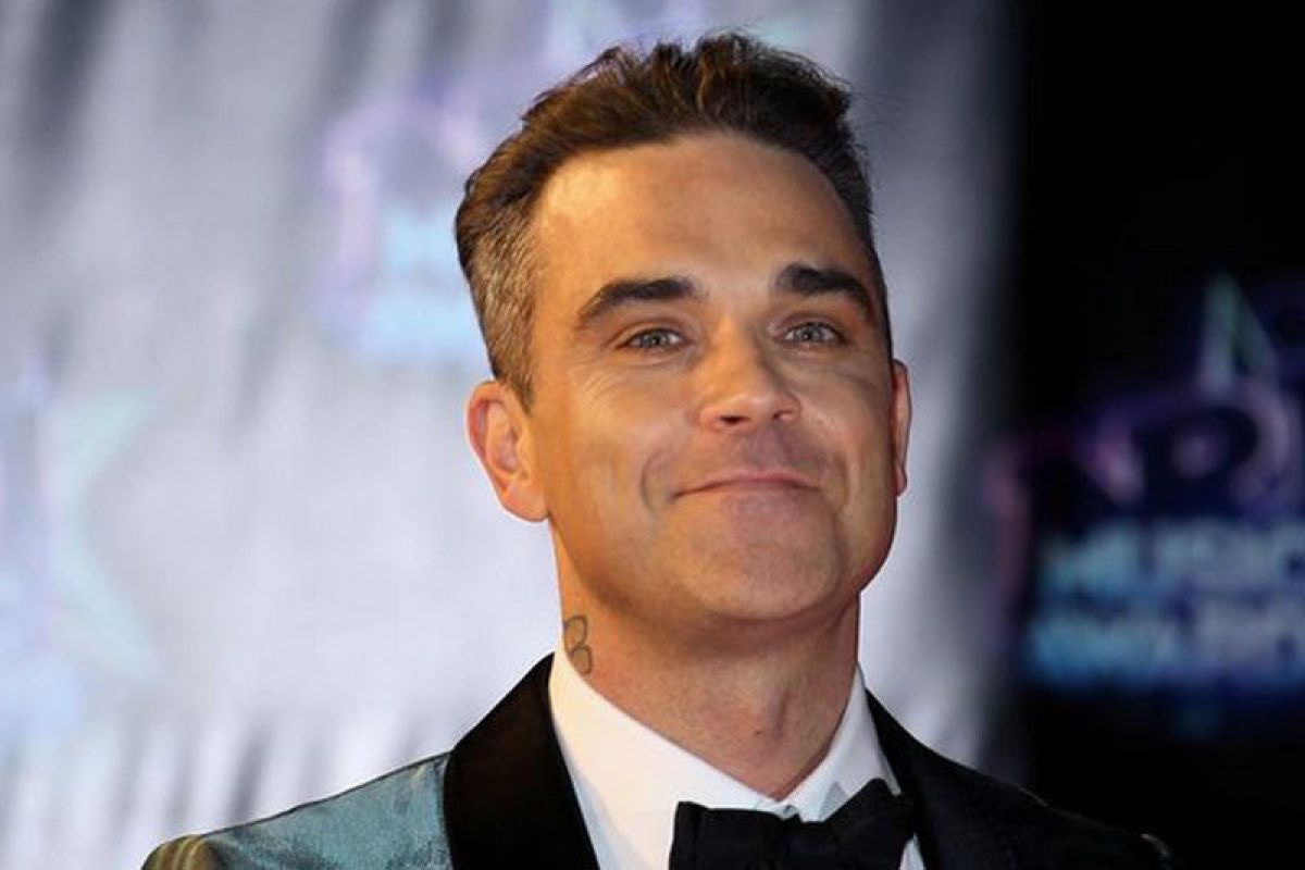 Robbie Williams akan luncurkan album Natal perdana