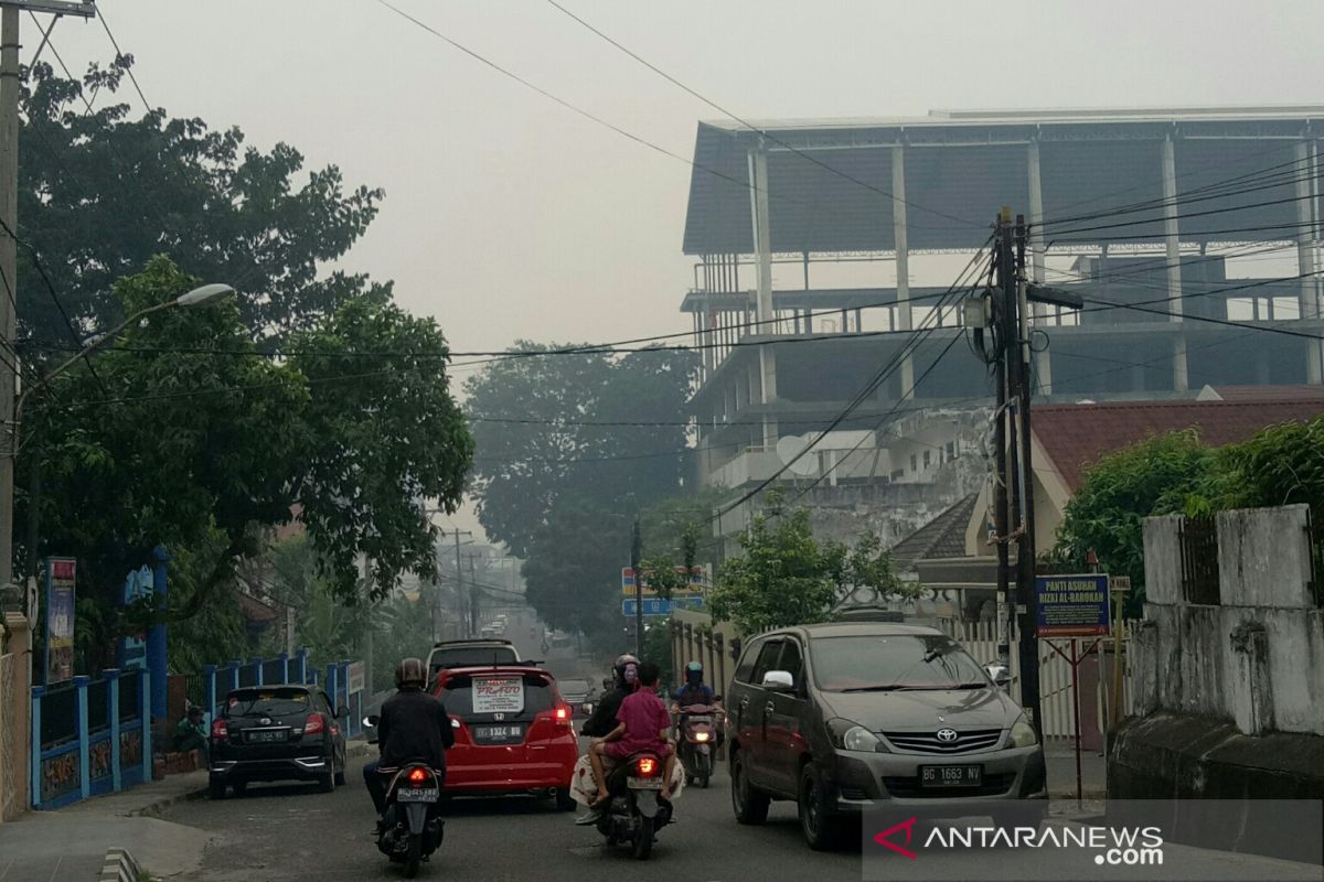 Asap terus  selimuti Palembang tiap sore sepekan terakhir