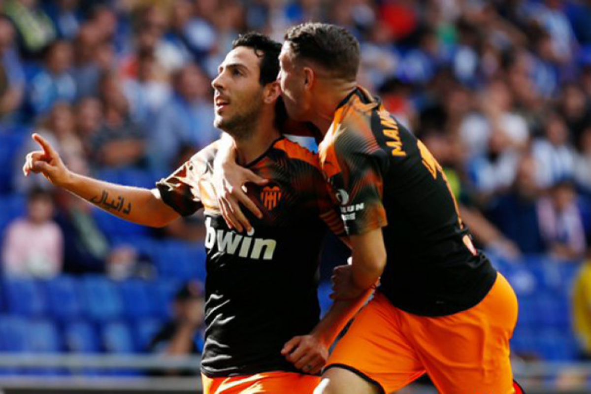 Valencia balikkan keadaan dan kalahkan Espanyol