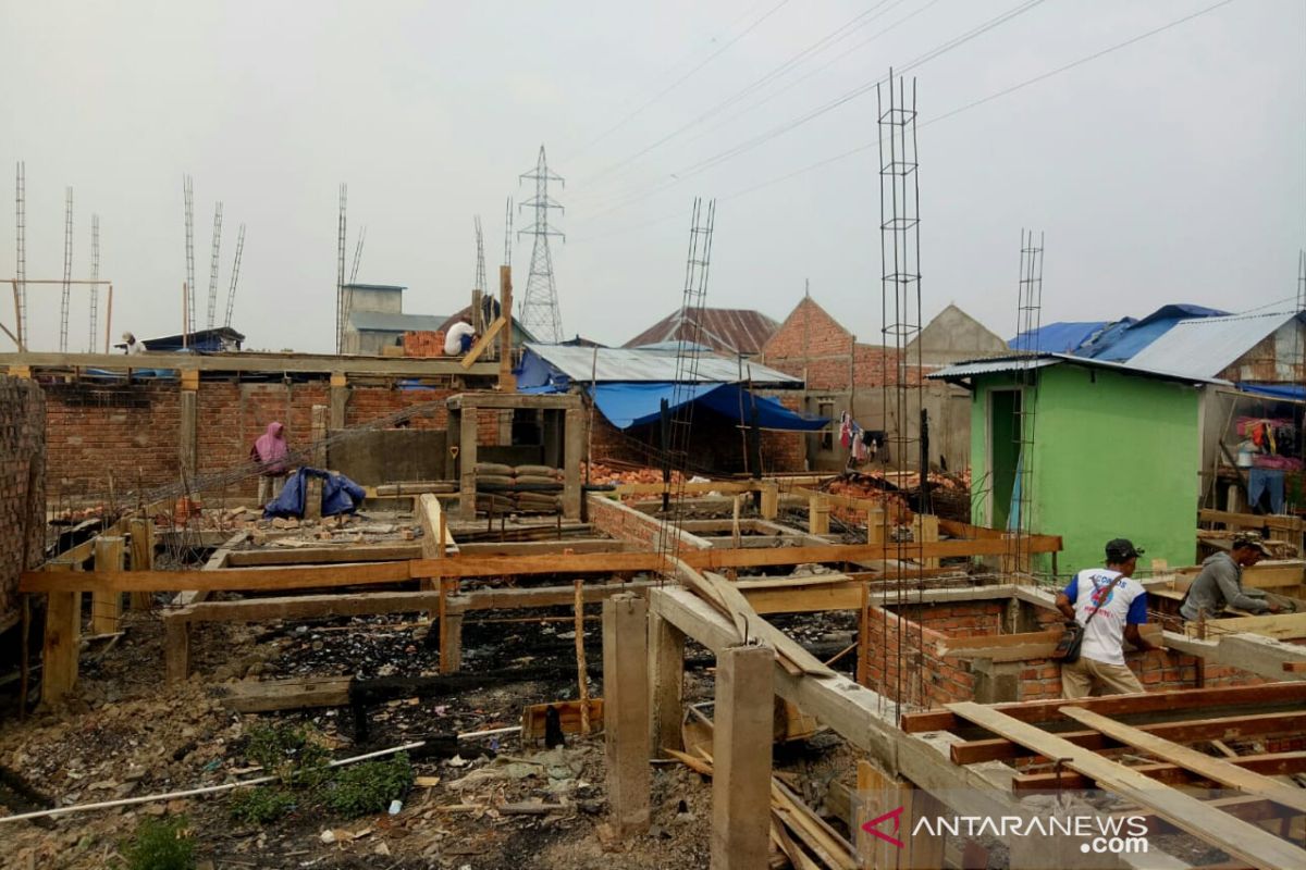 Pembangunan ratusan rumah yang terbakar di Palembang hampir selesai