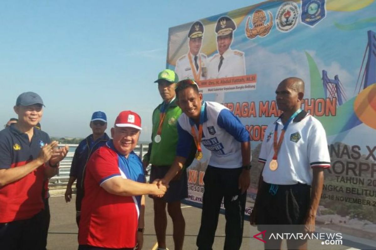 Yahuza persembahkan medali emas untuk Babel di marathon 10K Pornas Korpri