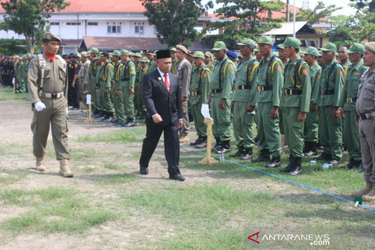 Apel gelar Linmas dan pelantikan kepala desa