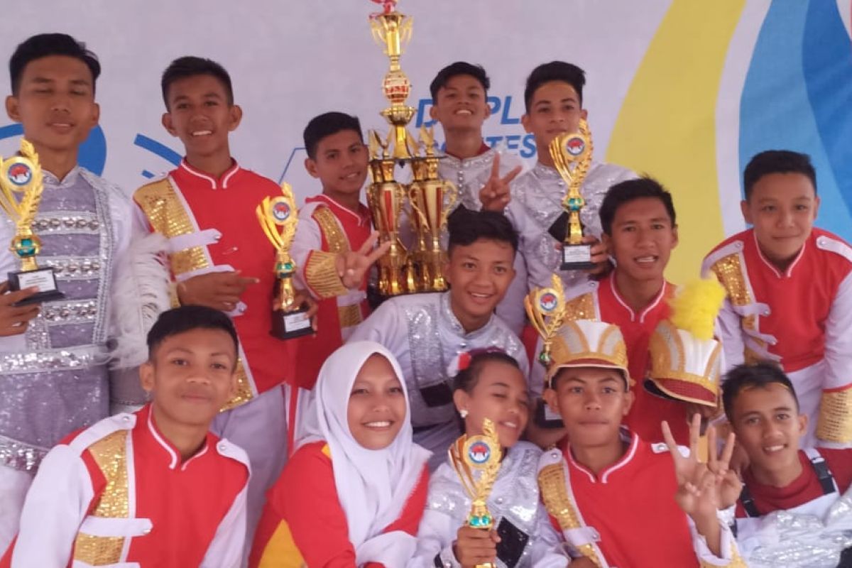 SMAN 1 Poso juara umum Tadulako Open Drum Competition 2019