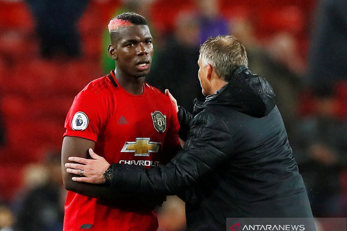 Kembalinya Paul Pogba ke Man United harus diundur karena sakit