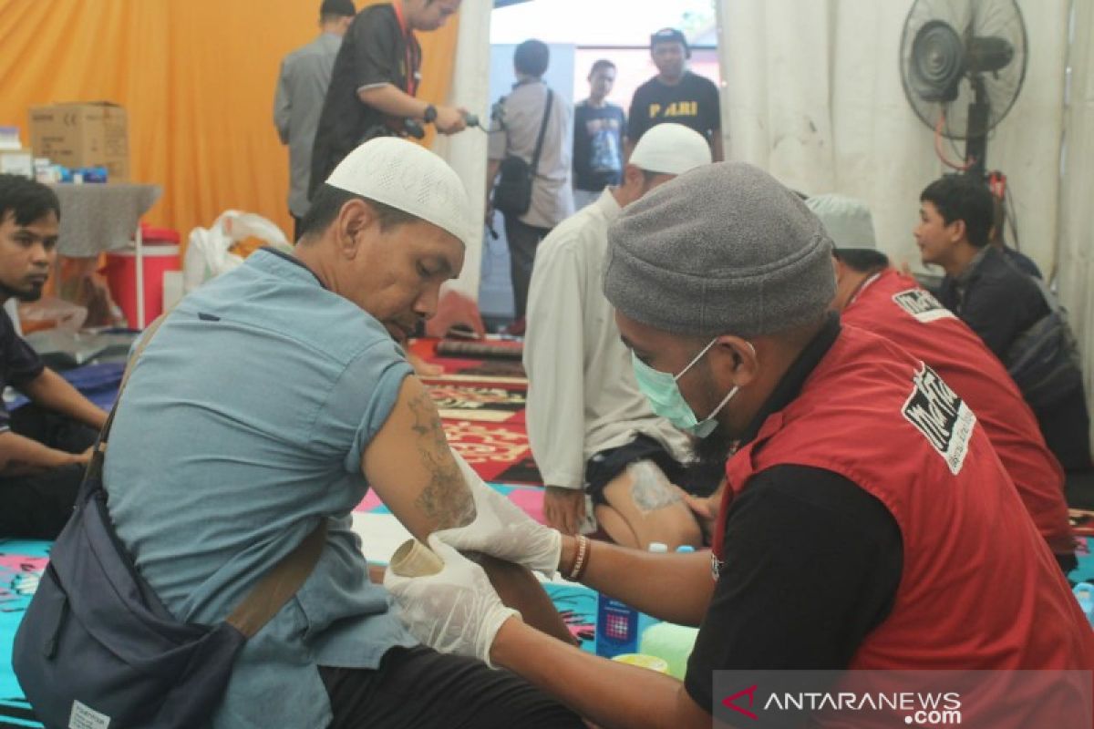 Mahtan menggelar penghapusan Tatto gratis di HUT DTT-SMDE Polda Sultra