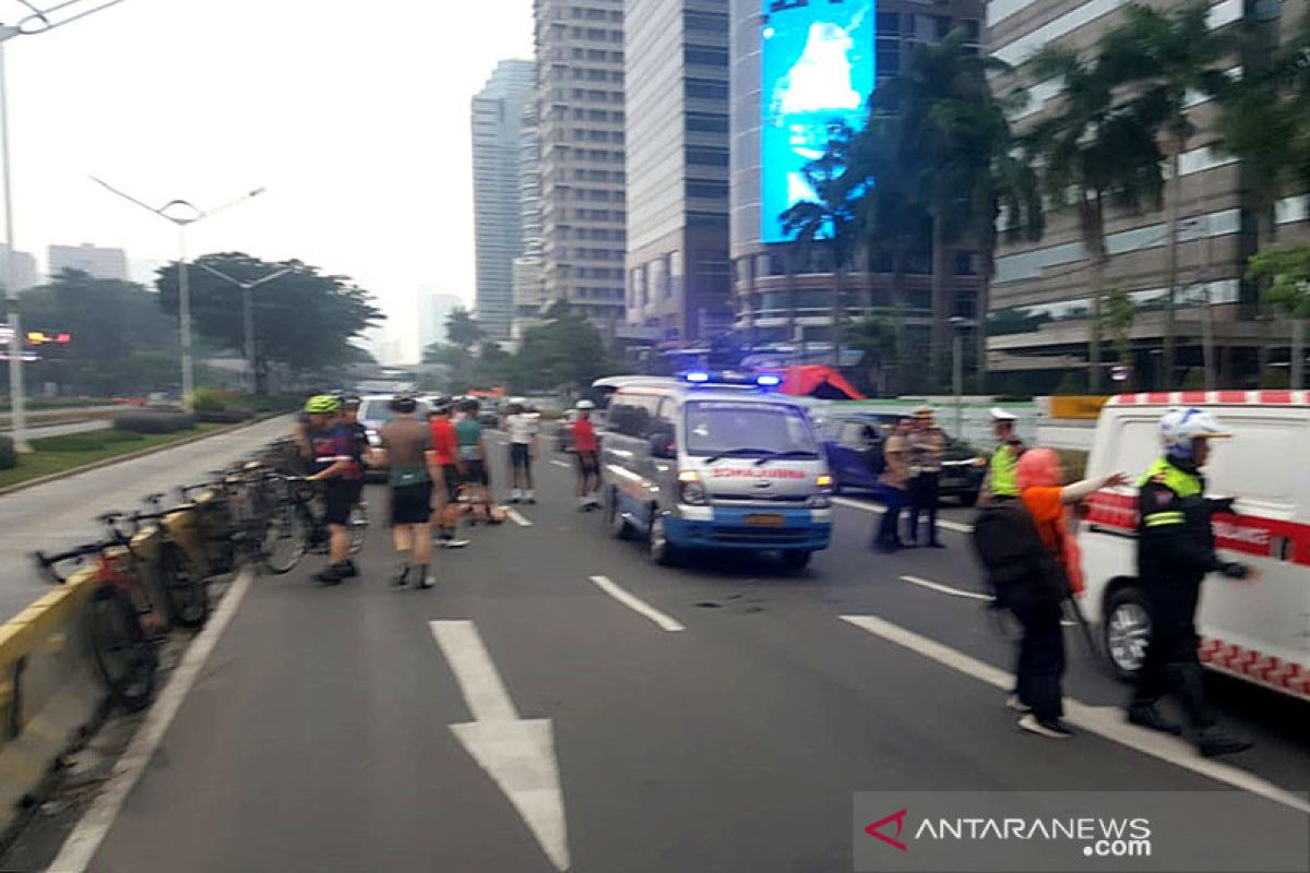 A van driver under drug influence hits seven bicyclists in Jakarta