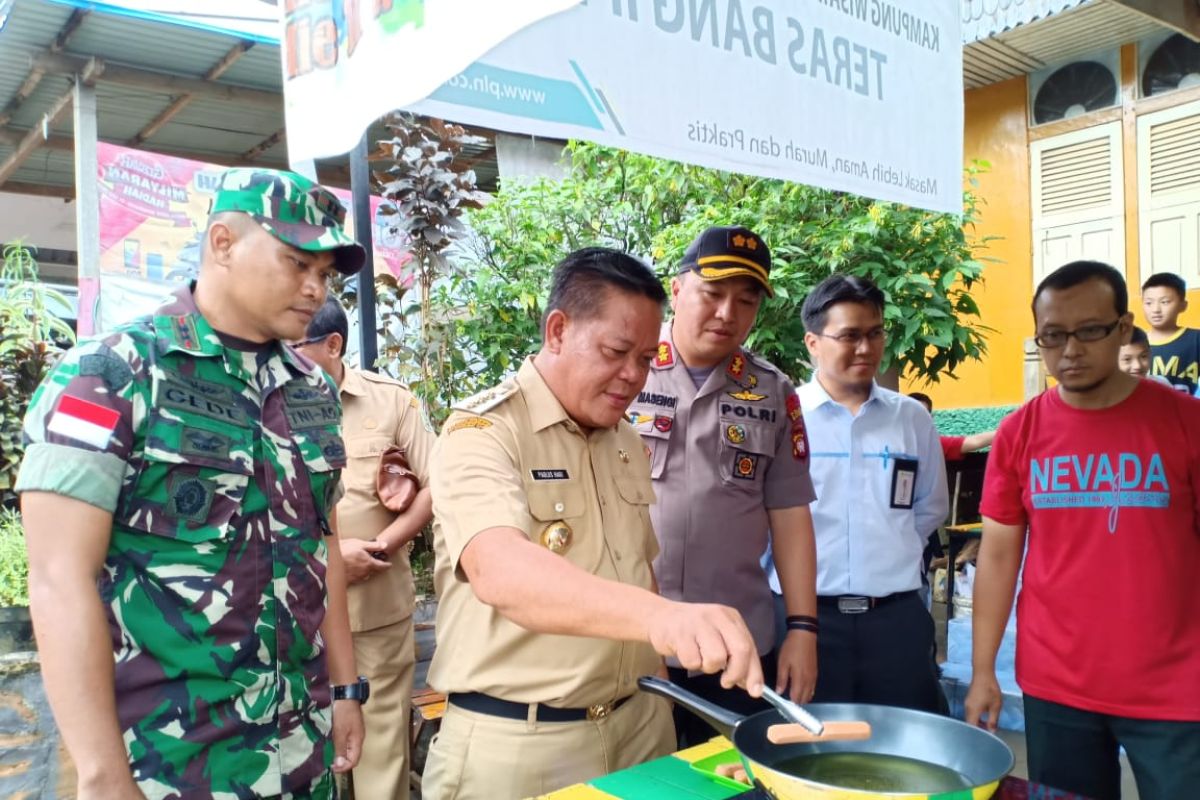 PLN dukung pedagang kuliner Kampung Sentana gunakan kompor induksi