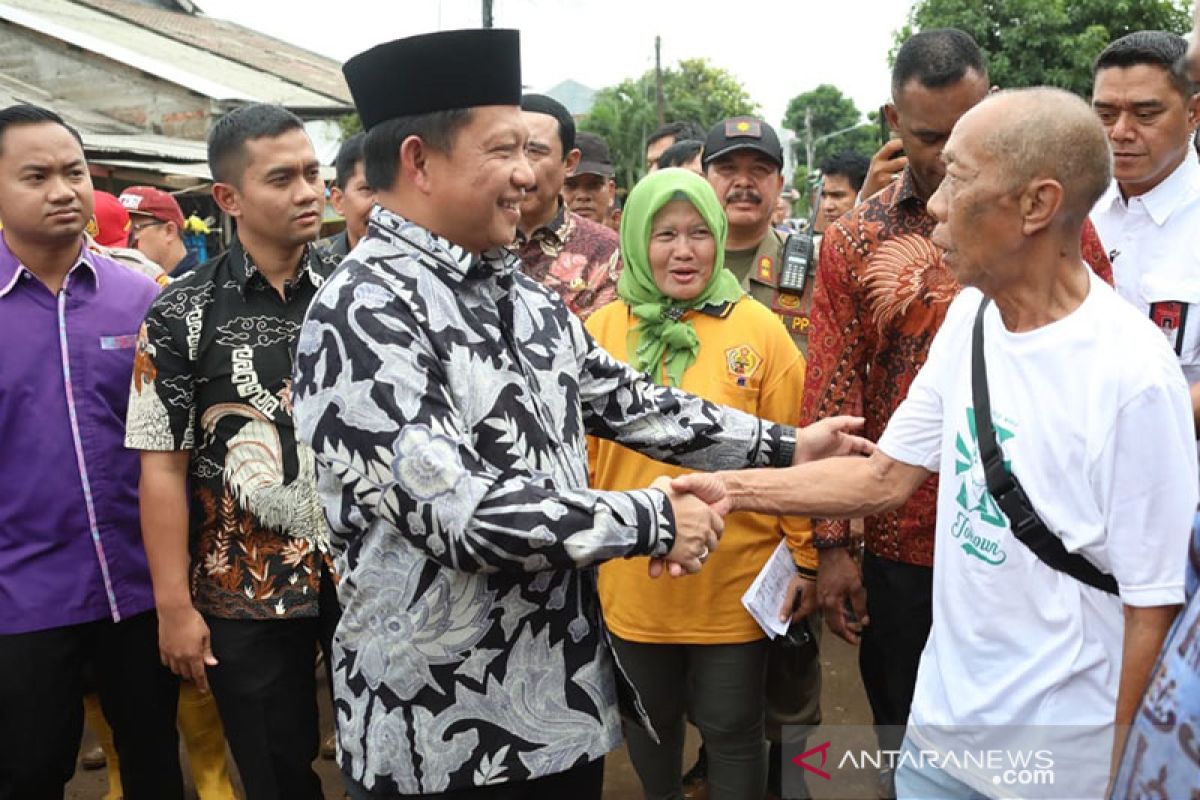 After floods, minister invites parties to work together