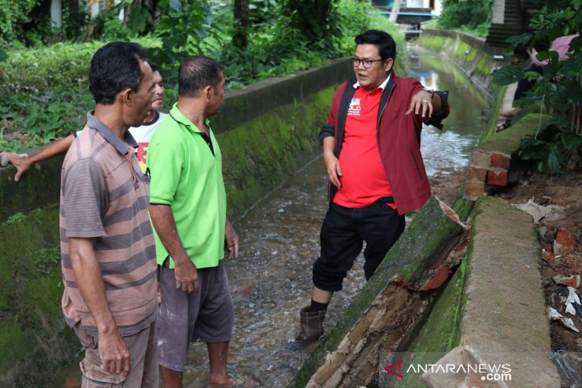 Wabup Ajak Masyarakat Basel Bergotongroyong Bersihkan Drainase