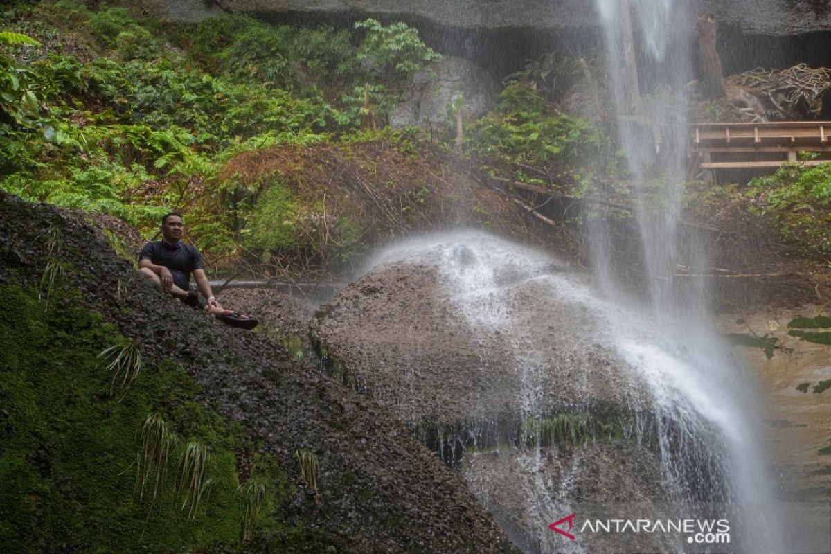 Destinasi wisata tersembunyi, Air Terjun Batu Tilam di Riau