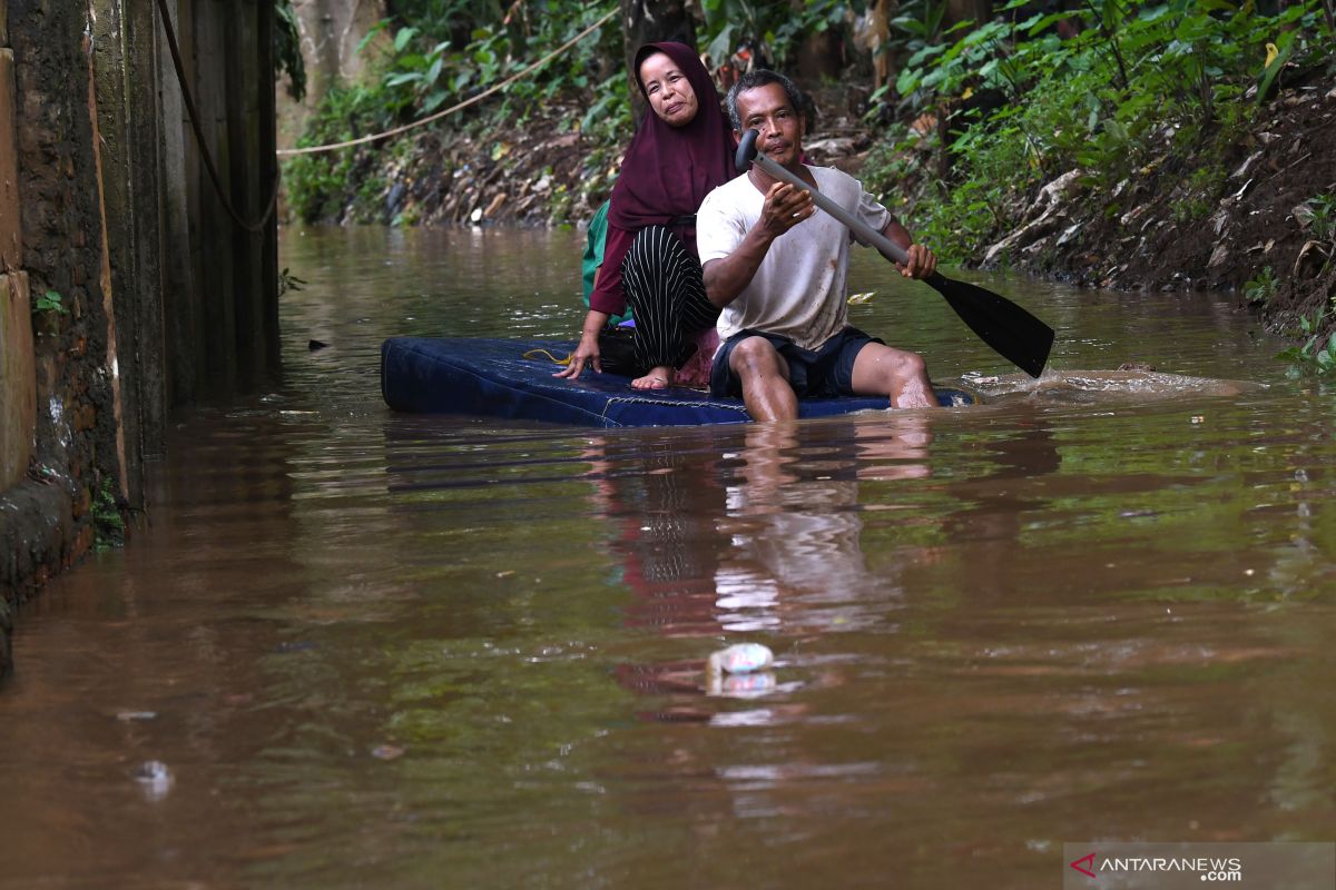 Jumat pagi, hujan masih membayangi wilayah Jakarta