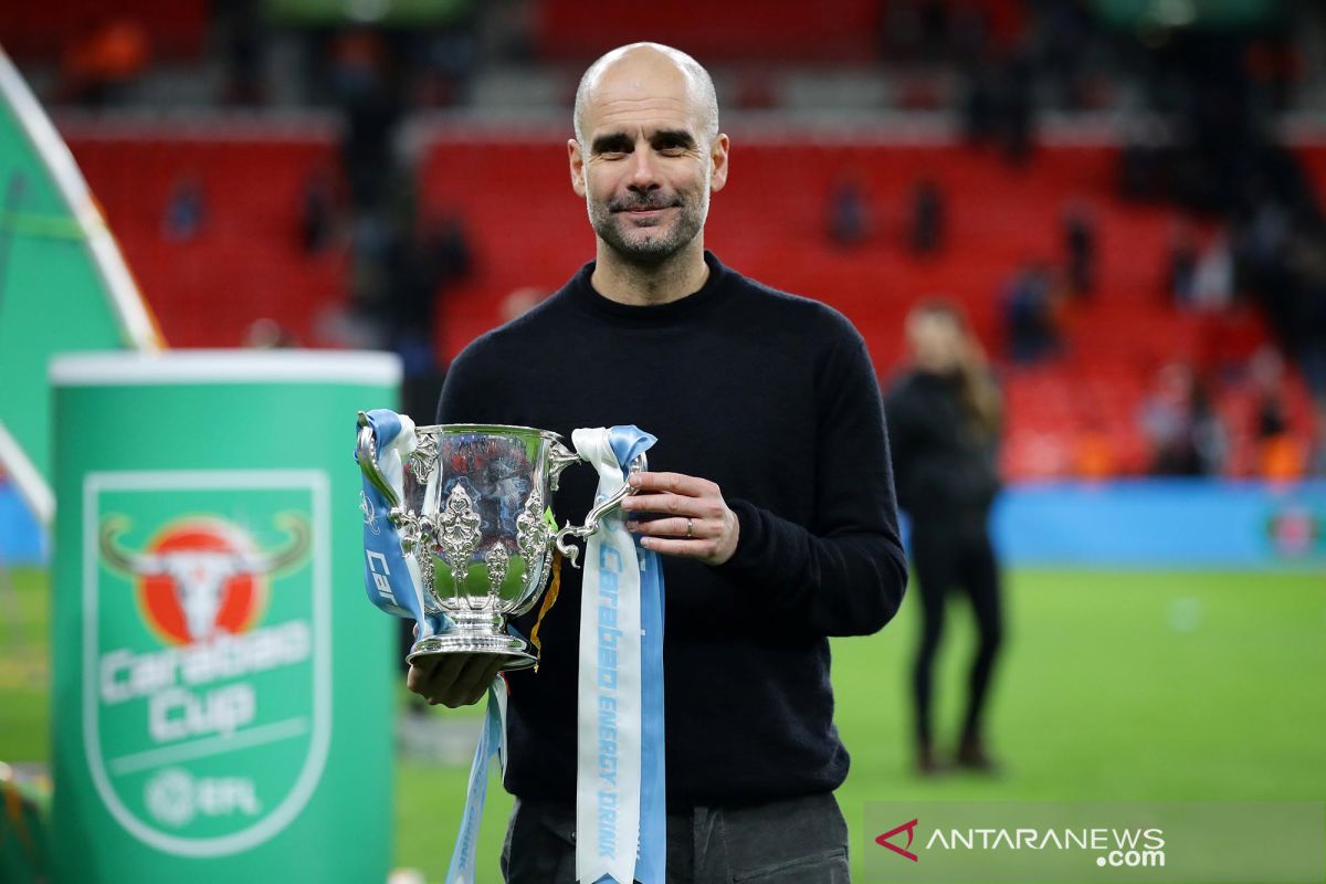 Rengkuh Piala Liga, Guardiola ogah buru-buru klaim bisa juarai FA