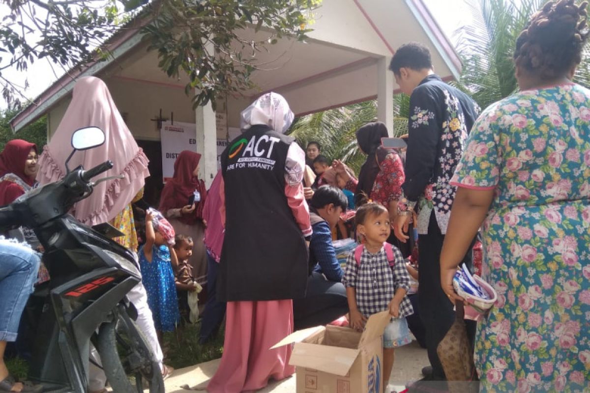 ACT Riau beri edukasi parenting dan distribusi pakaian bayi di Puskesmas Kampar
