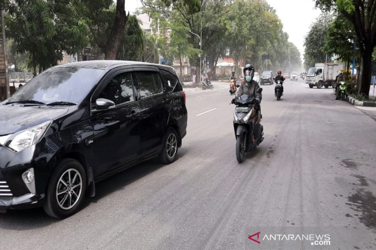 Hujan abu Merapi sampai ke Kota Solo