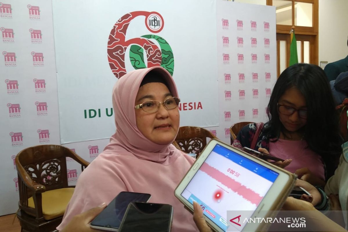 Erlina Burhan: Nakes perempuan punya peran ganda