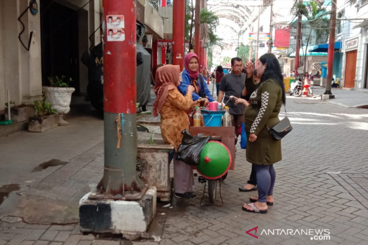 Penjual jamu keliling promosikan 