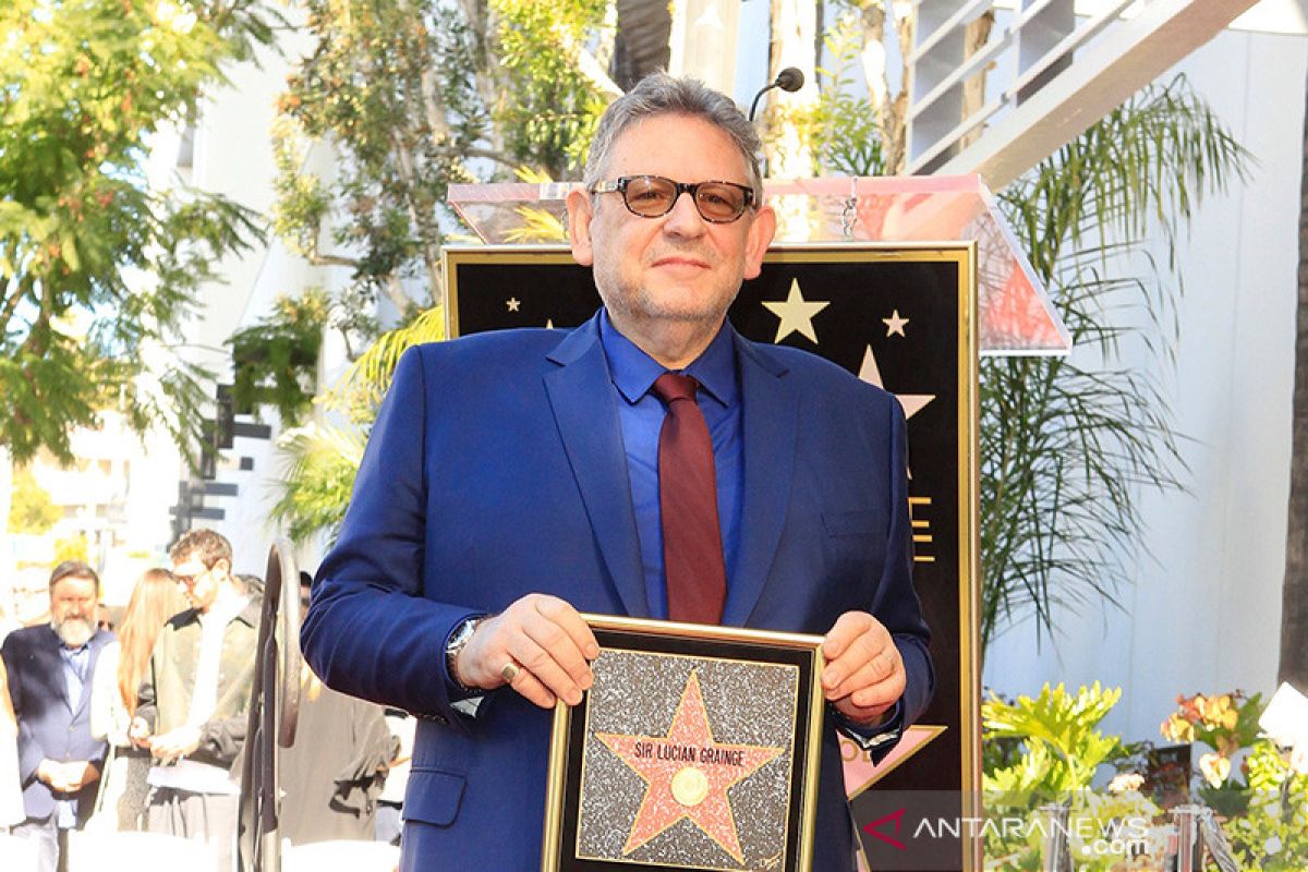 CEO Universal Music Lucian Grainge positif corona