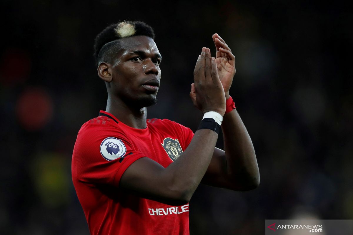 Paul Pogba kenakan seragam Juventus saat latihan