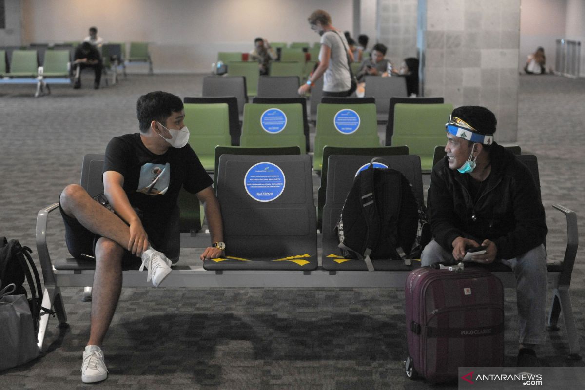 Social distancing practiced among passengers at Bali airport