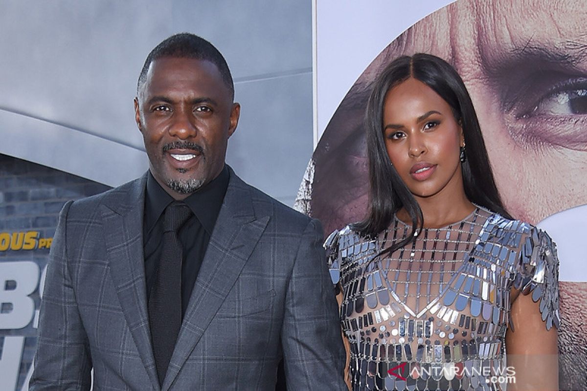 Istri Idris Elba positif corona gara-gara selalu dampingi suami