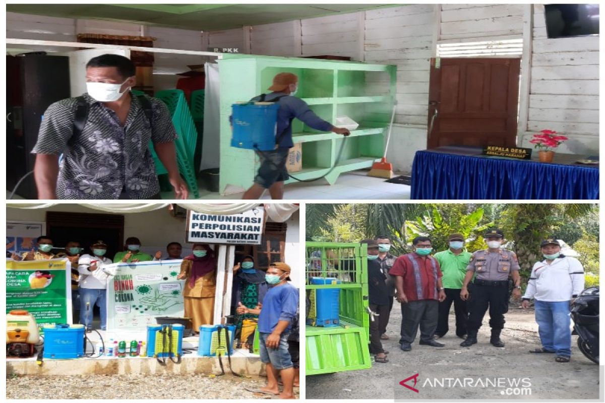 Penyemprotan disinfektan di Desa Situmba Tantom Angkola