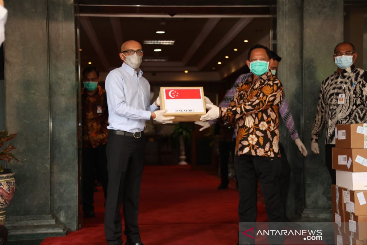Indonesia receives 10,000 COVID-19 test kits from Singapore