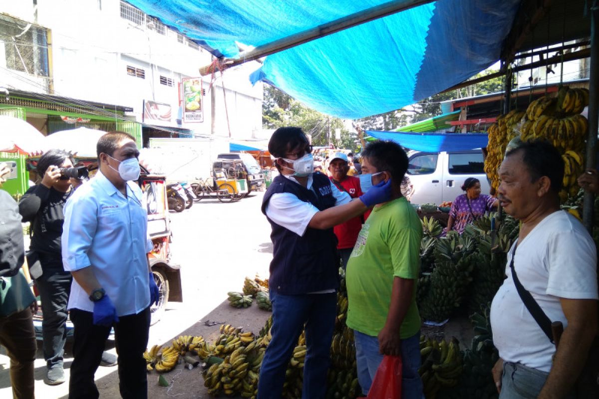 PMI Makassar bersama berbagai lembaga sosialisasi cegah COVID-19 di pasar