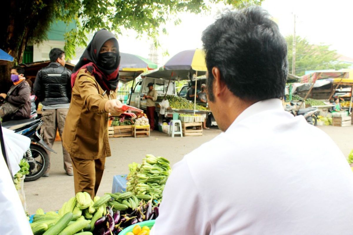 Pelaku usaha mikro di Palangka Raya terima bantuan masker