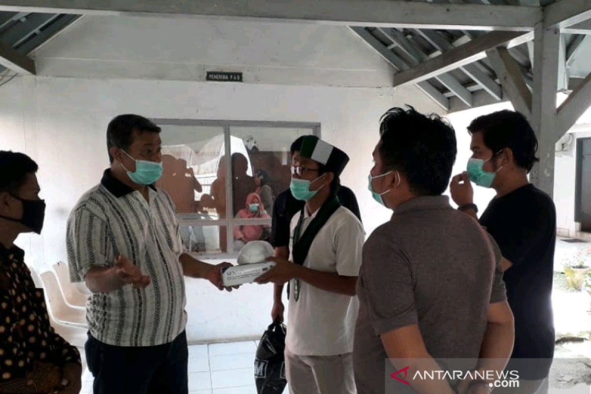 HMI bantu masker N95 RSUD Kota Padangsidimpuan