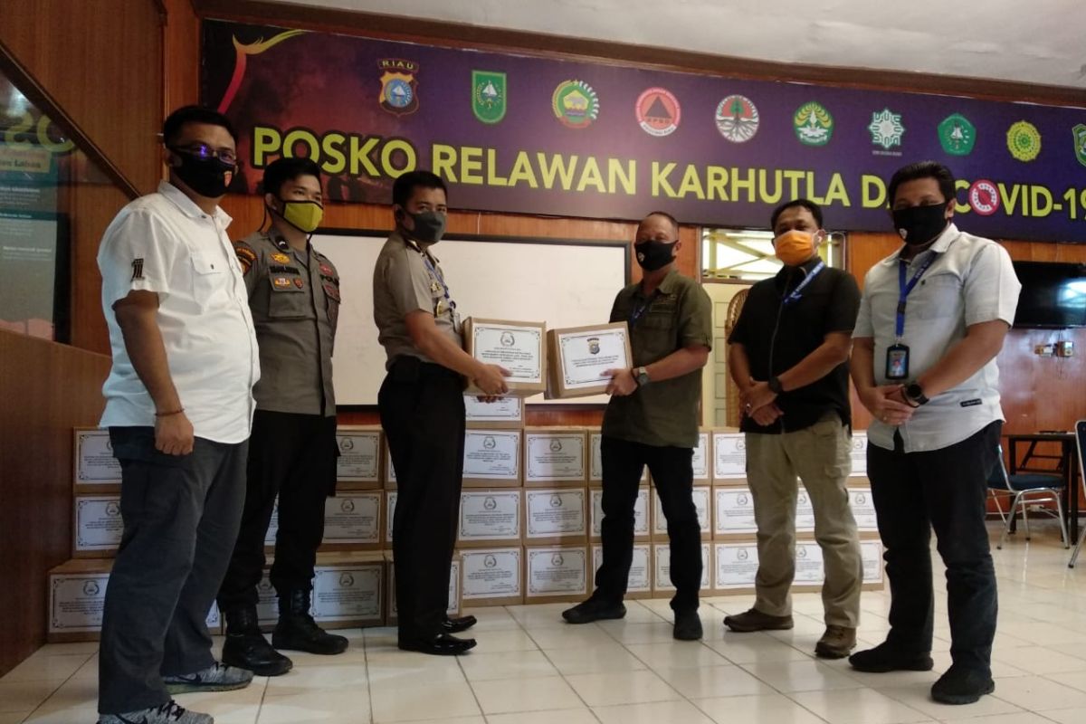 Polda Riau kembali gandeng driver Ojol Rijek distribusi ratusan paket sembako