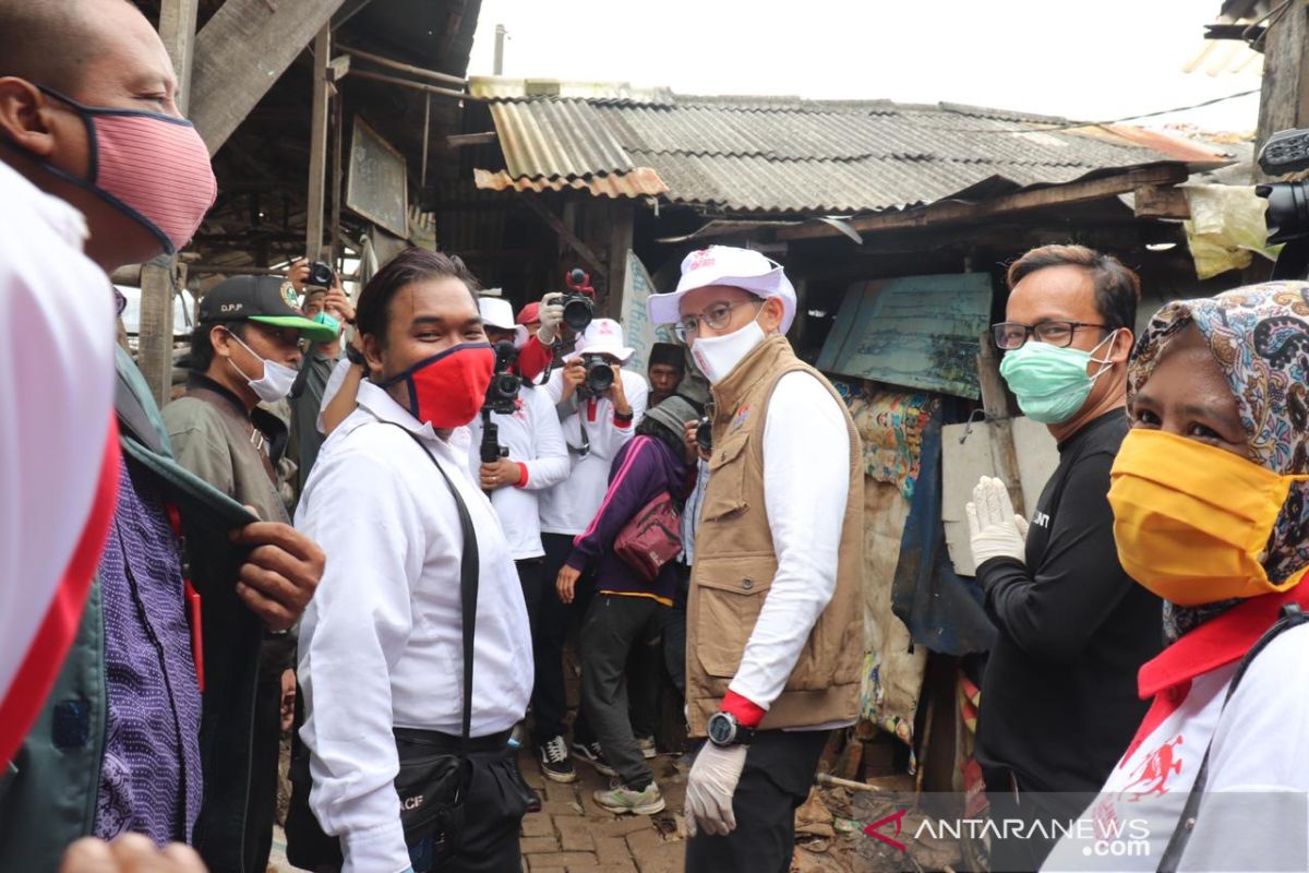 Relawan Jokowi-Sandiaga bersatu aksi peduli lawan COVID-19