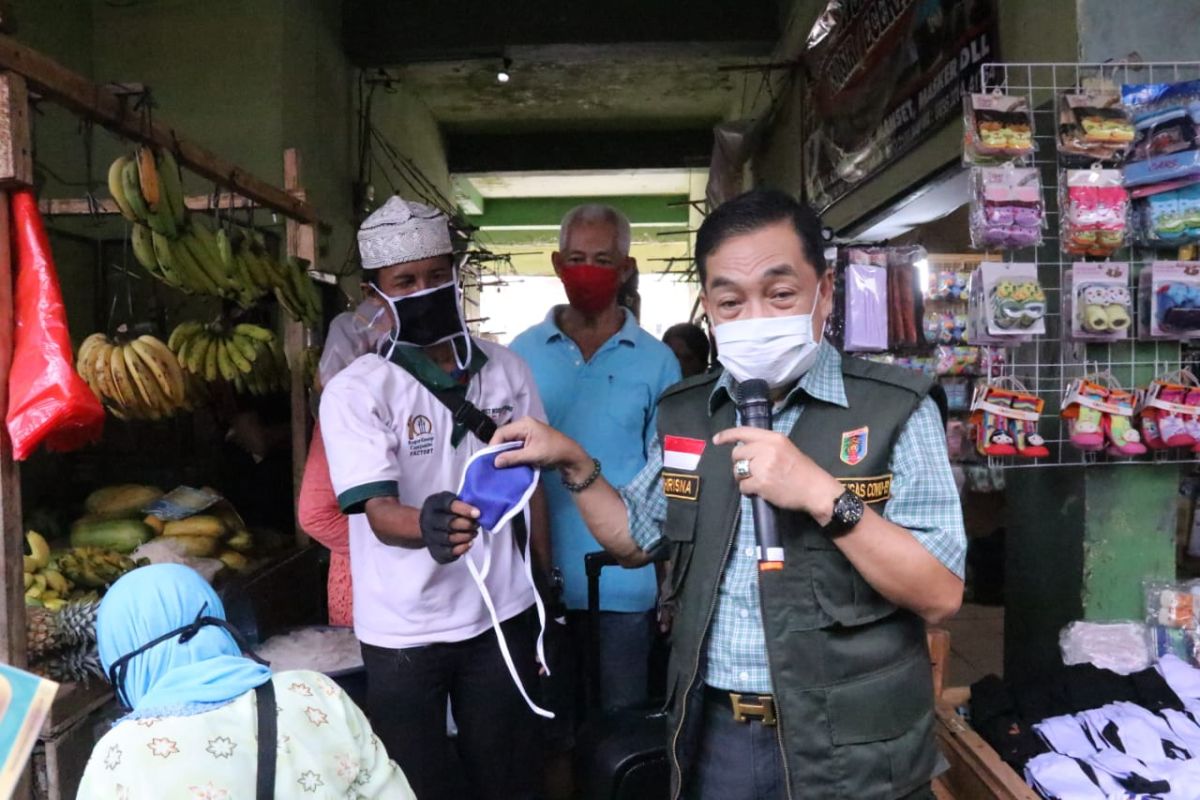 Pemprov Lampung lakukan sosialisasi COVID-19 di pasar tradisional
