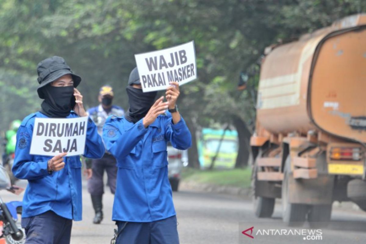 Warga yang tidak pakai masker dikenai sanksi dan KTP ditahan