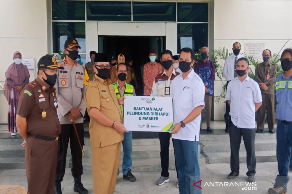 Adaro hands over ambulance and PPE for Balangan