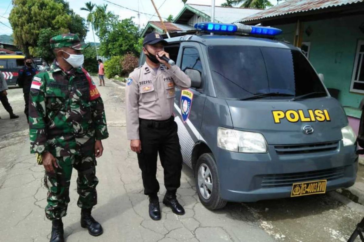 Sinergitas Polri-TNI imbau warga Kampung Buton cegah corona