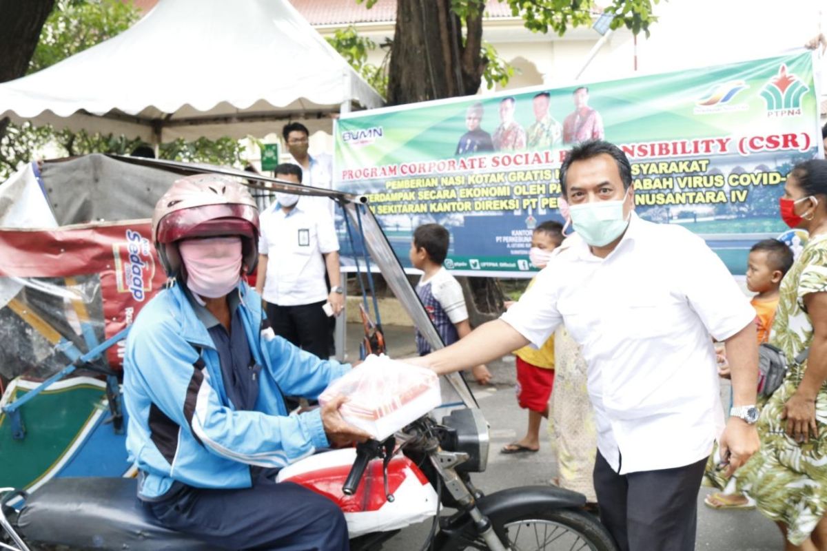 PTPN IV bagikan ribuan nasi kotak kepada warga sekitar terdampak COVID19