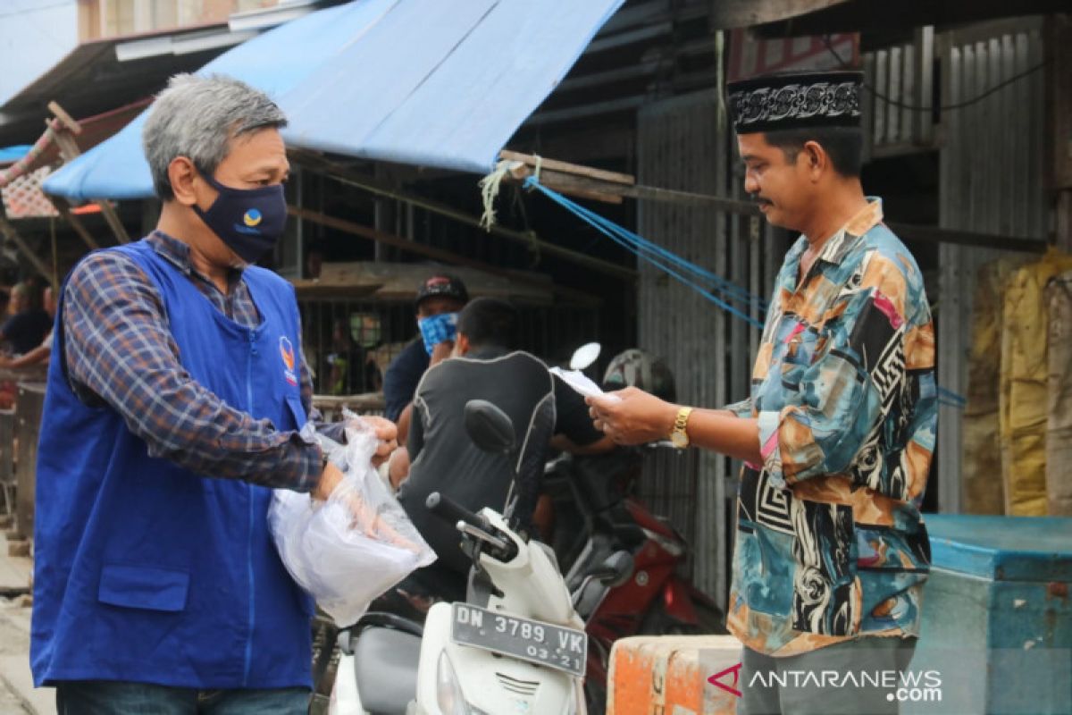 NasDem  bagikan 70 ribu masker untuk cegah corona di 13 daerah Sulteng