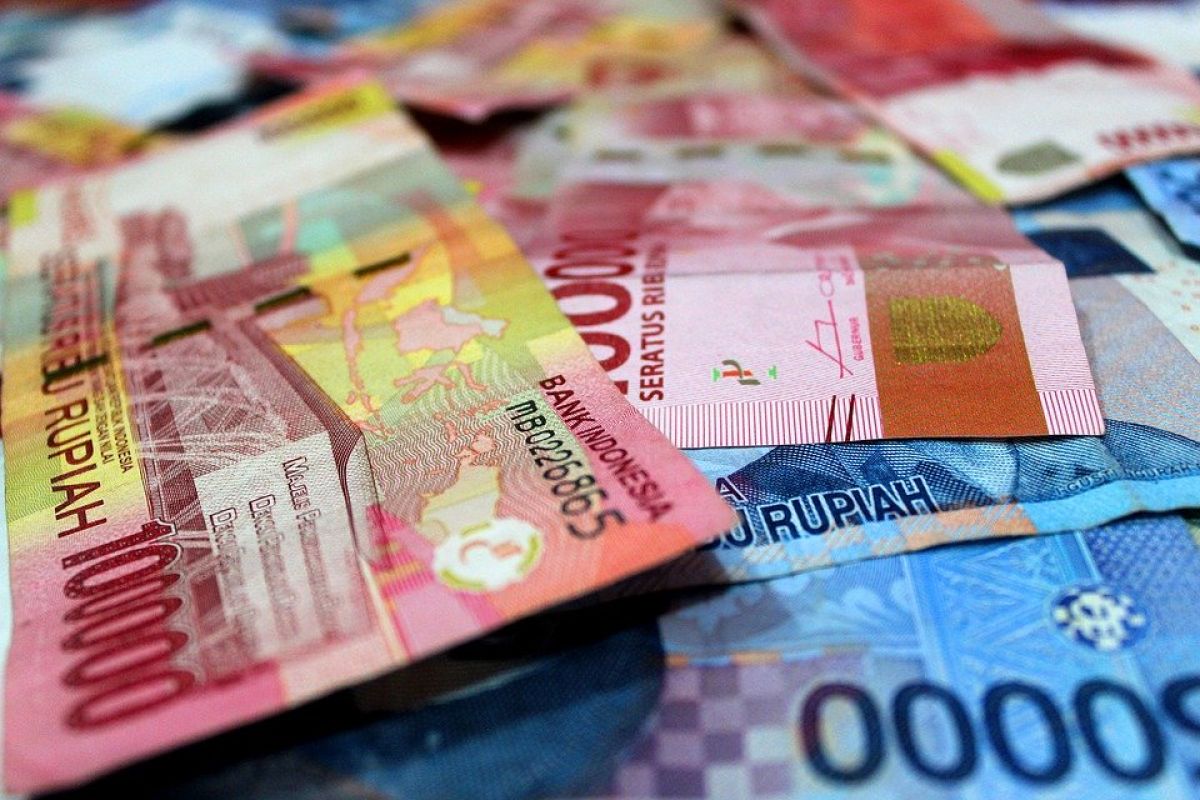 Rupiah ditutup positif pada akhir pekan seiring dengan kembalinya optimisme pasar