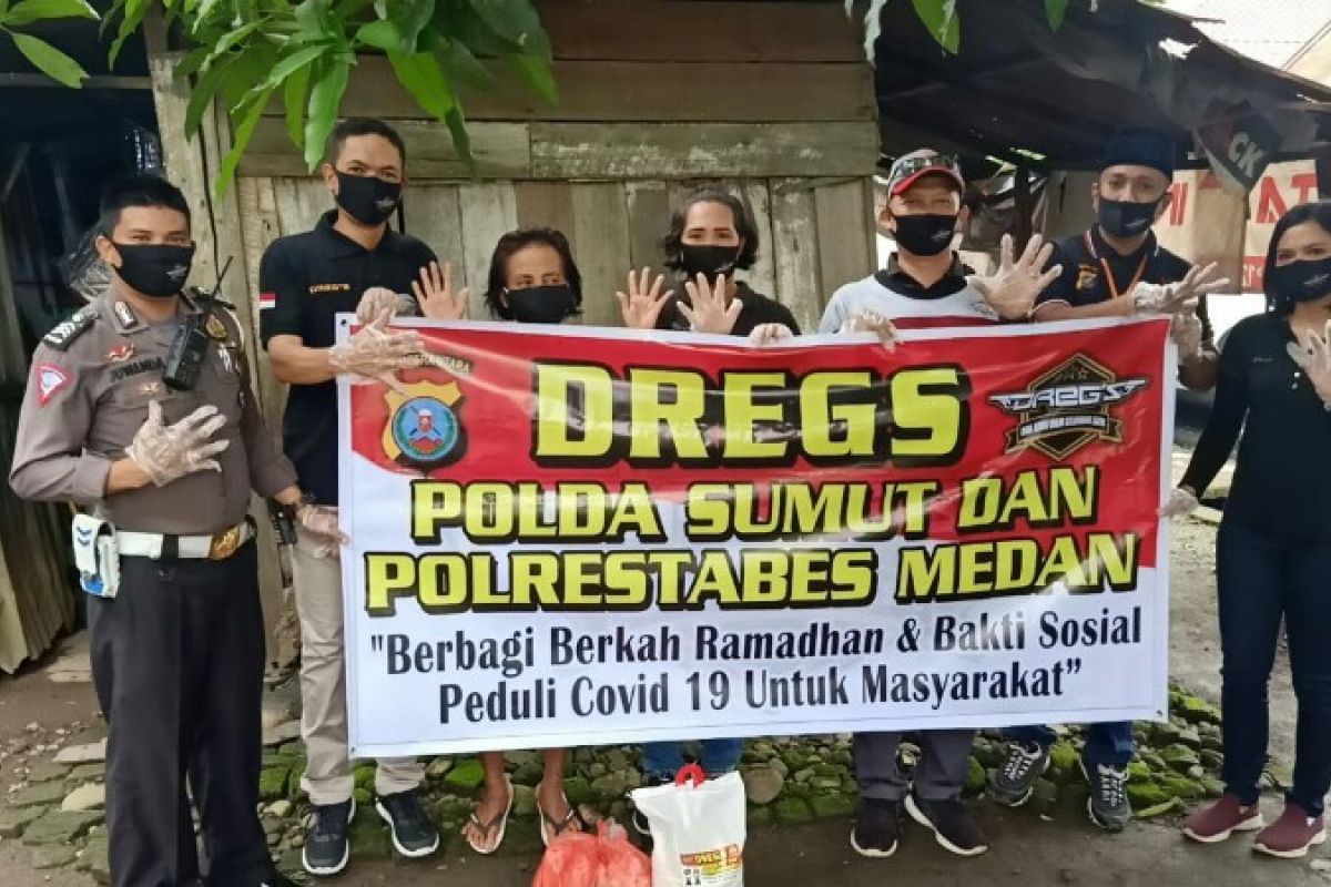 DREG'S Poldasu dan Polresta Medan berbagi sembako ke warga kurang mampu