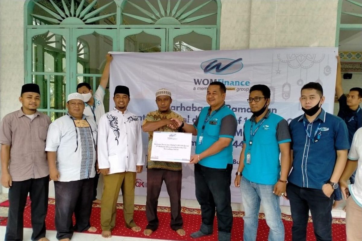 Ramadhan 1441 H, WOM Finance bagikan Al-Quran