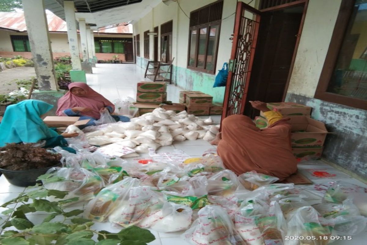 Muhammadiyah Pantai Cermin Tanjung Pura Langkat gelar pasar murah